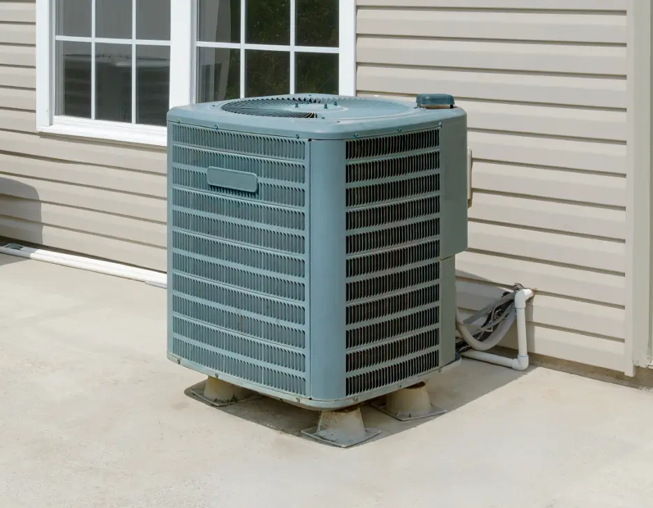 An air conditioning unit sitting outside.