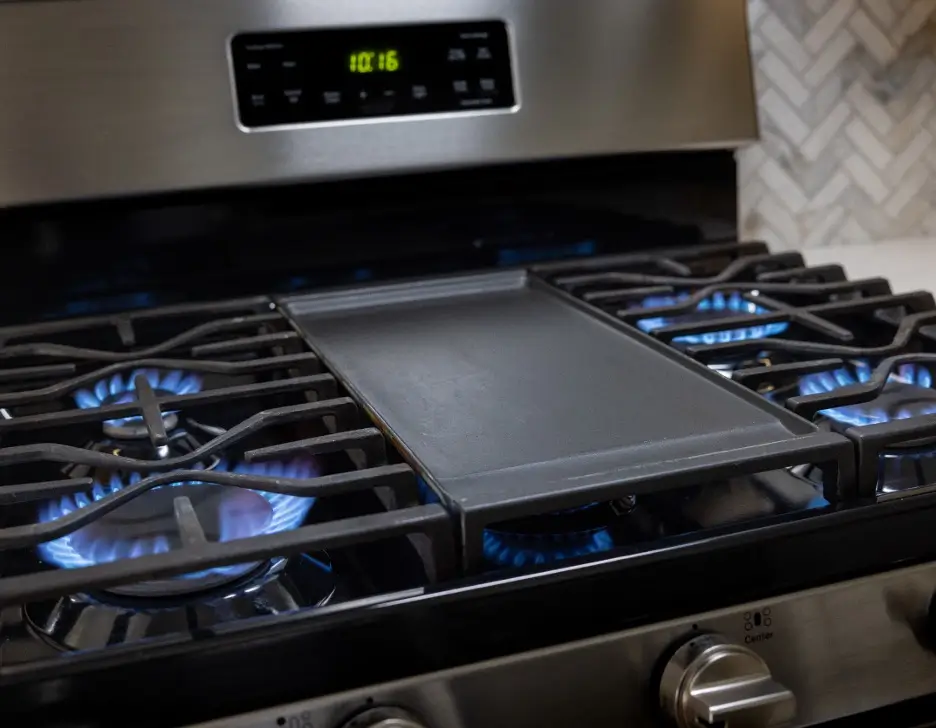 An oven with the burners on.